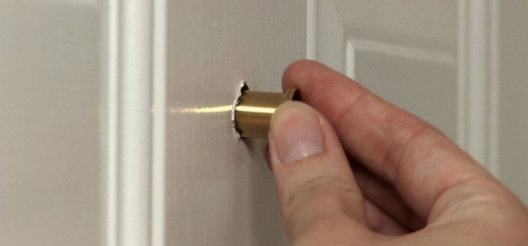 peephole door repair in Bell